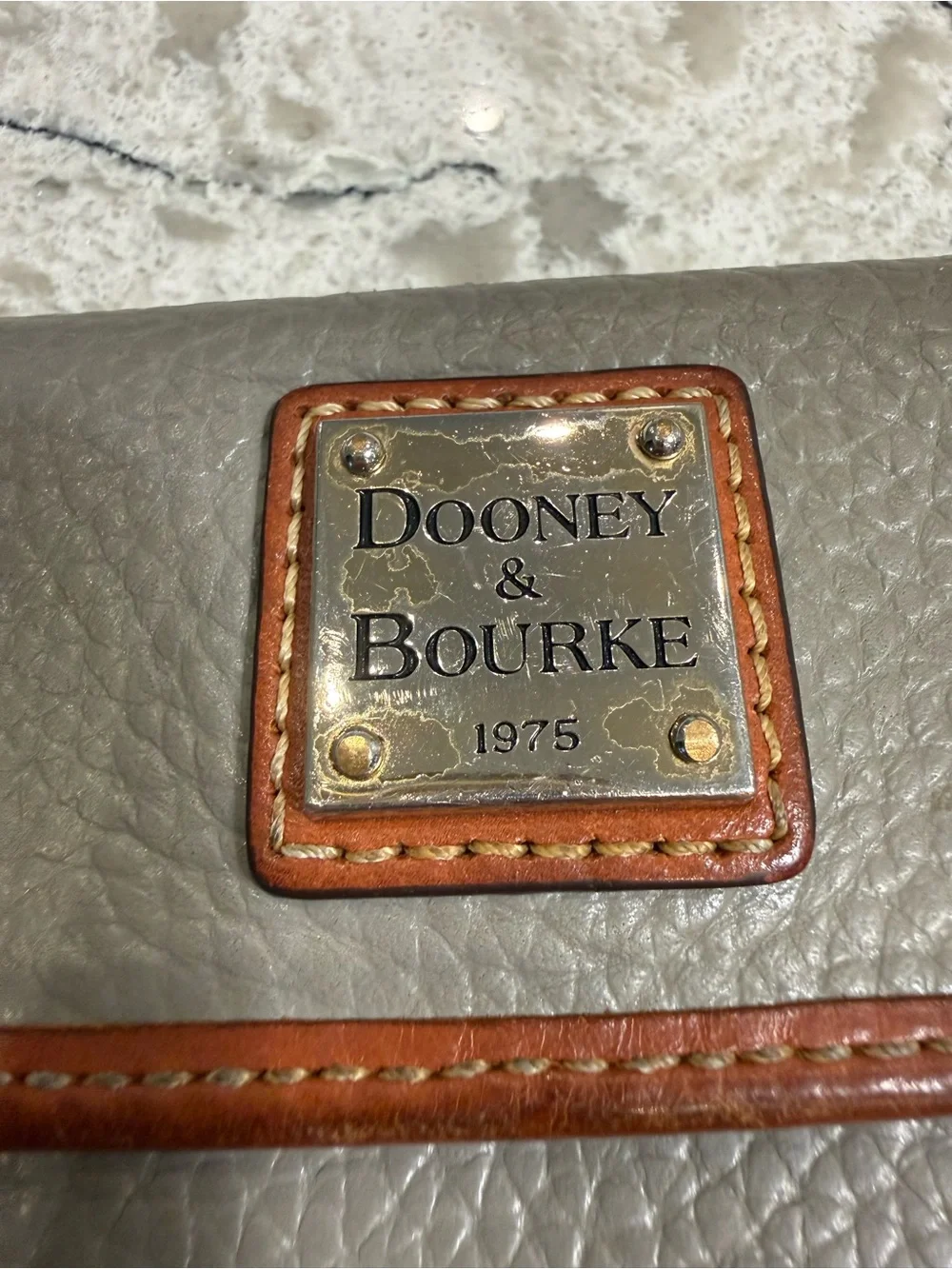 Dooney & Bourke Pebble Grain Continental Clutch Wallet in Gray with Tan Trim
